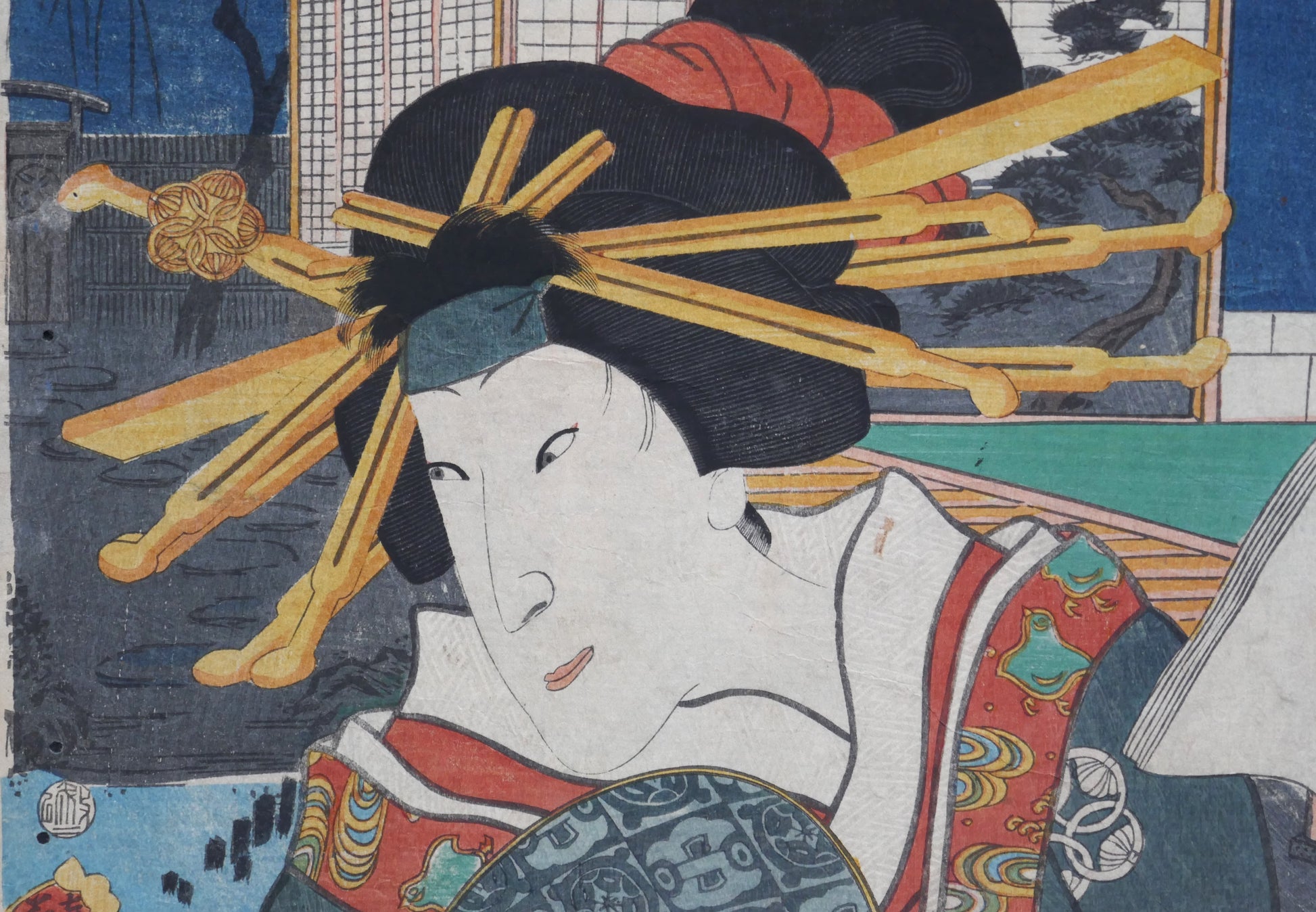 Gros plan du visage de l’acteur Sawamura Tanosuke dans le rôle d’Okaru, style onnagata.