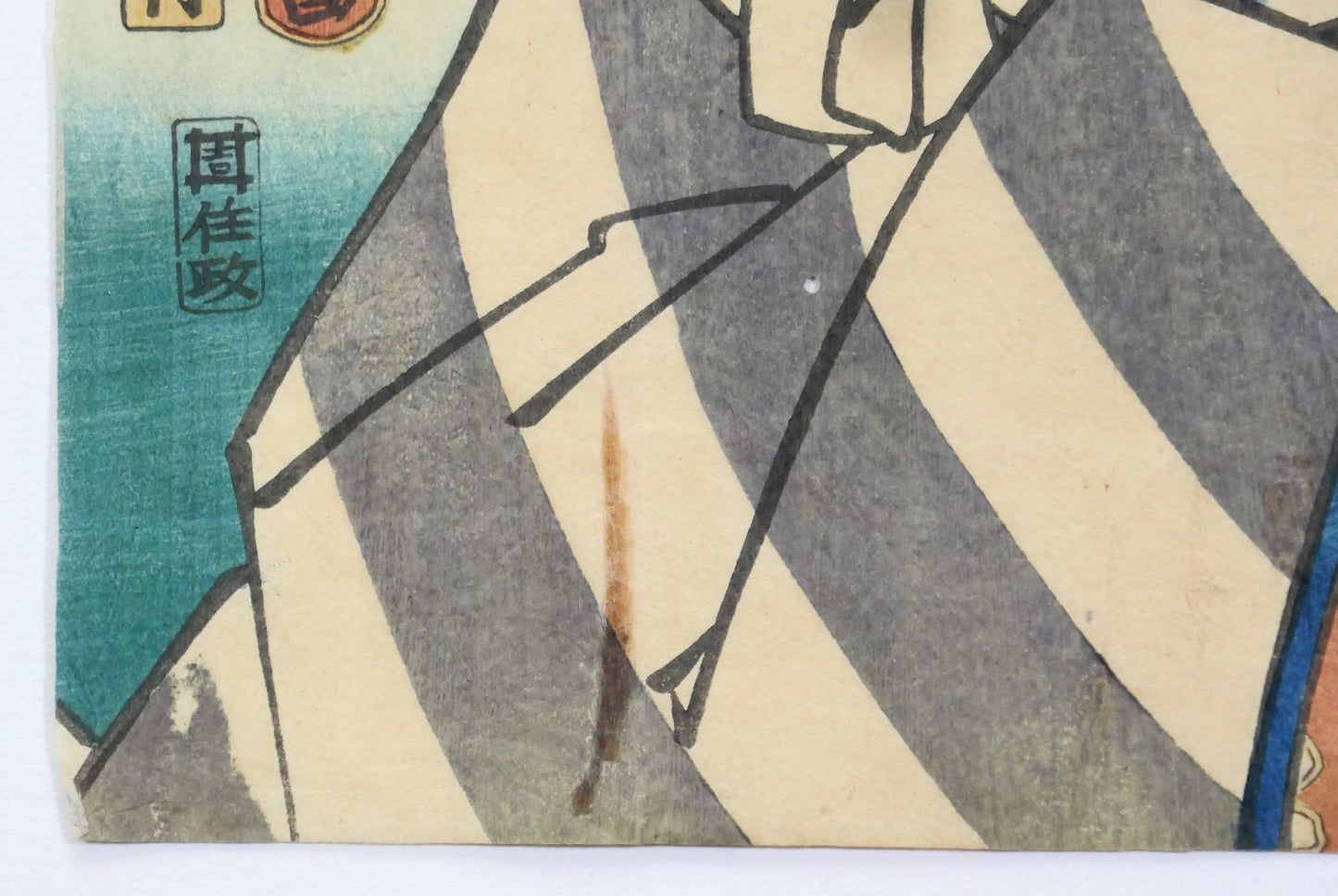 Détail du kimono rayé porté par un acteur de kabuki dans une estampe ukiyo-e