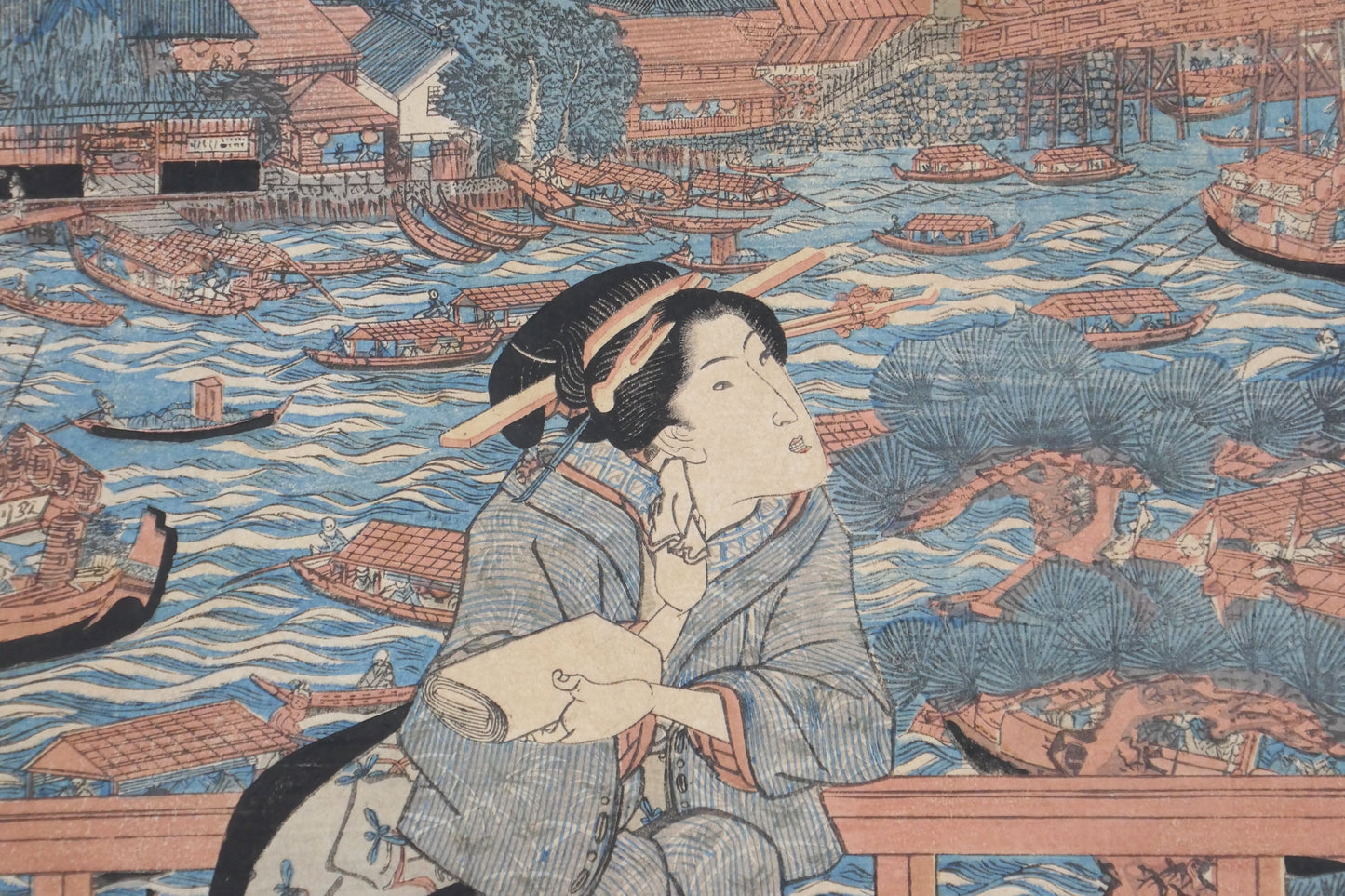 Jeune femme en kimono profitant de la fraîcheur du soir au bord de la rivière Sumida, estampe ukiyo-e de Kunisada vers 1825.