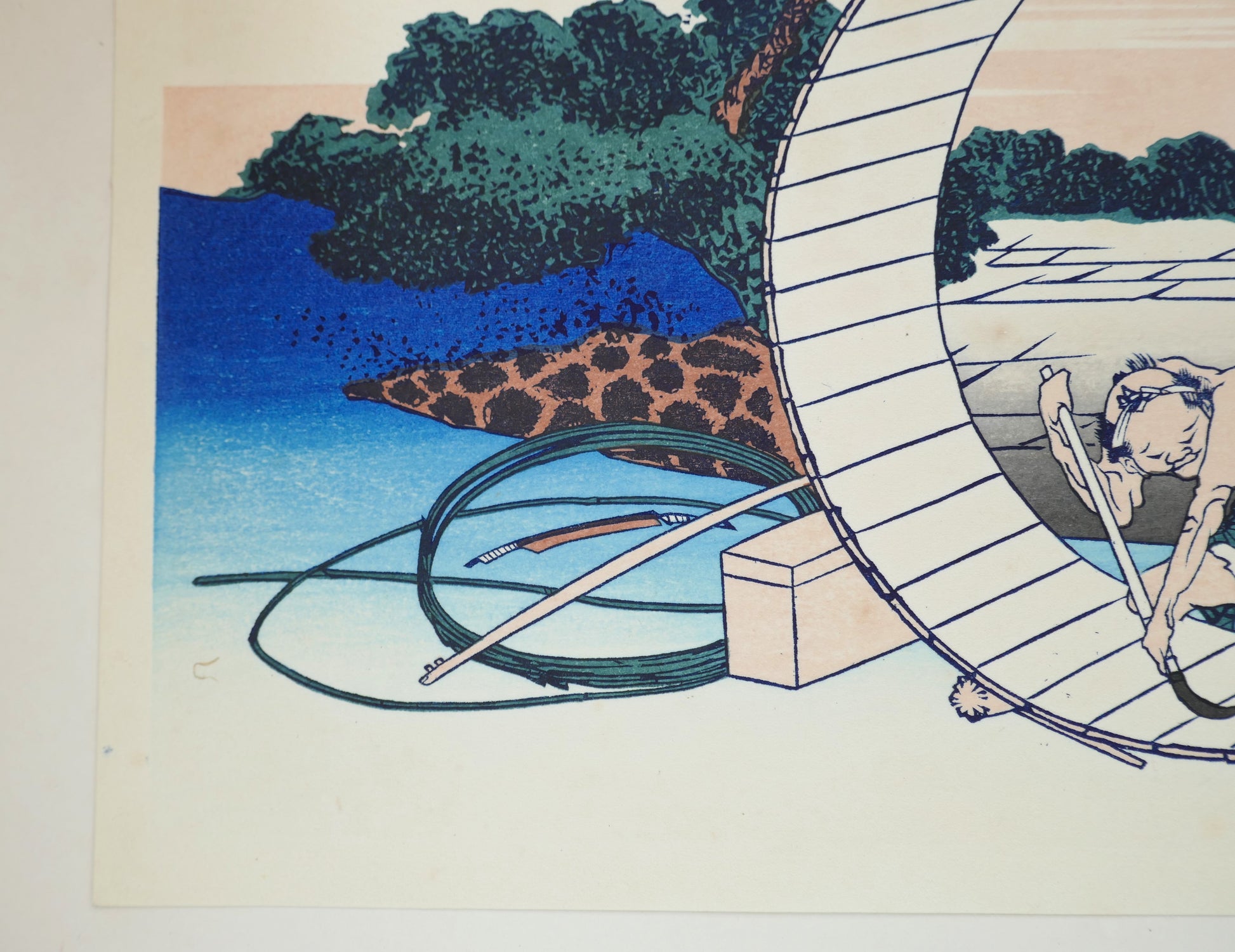 Détail de l’estampe montrant les outils et matériaux de l’artisan tonnelier dans Fujimigahara par Hokusai.