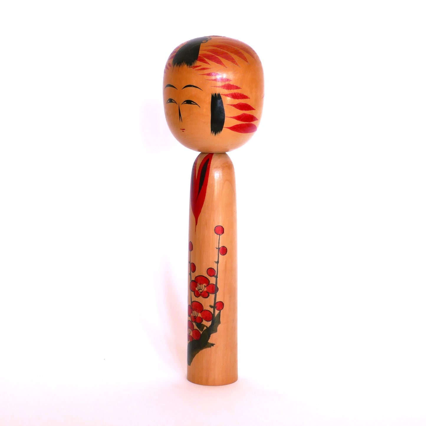 Profil gauche d’une kokeshi Togatta traditionnelle signée Satō Kesakichi – artisanat japonais de la période Shōwa