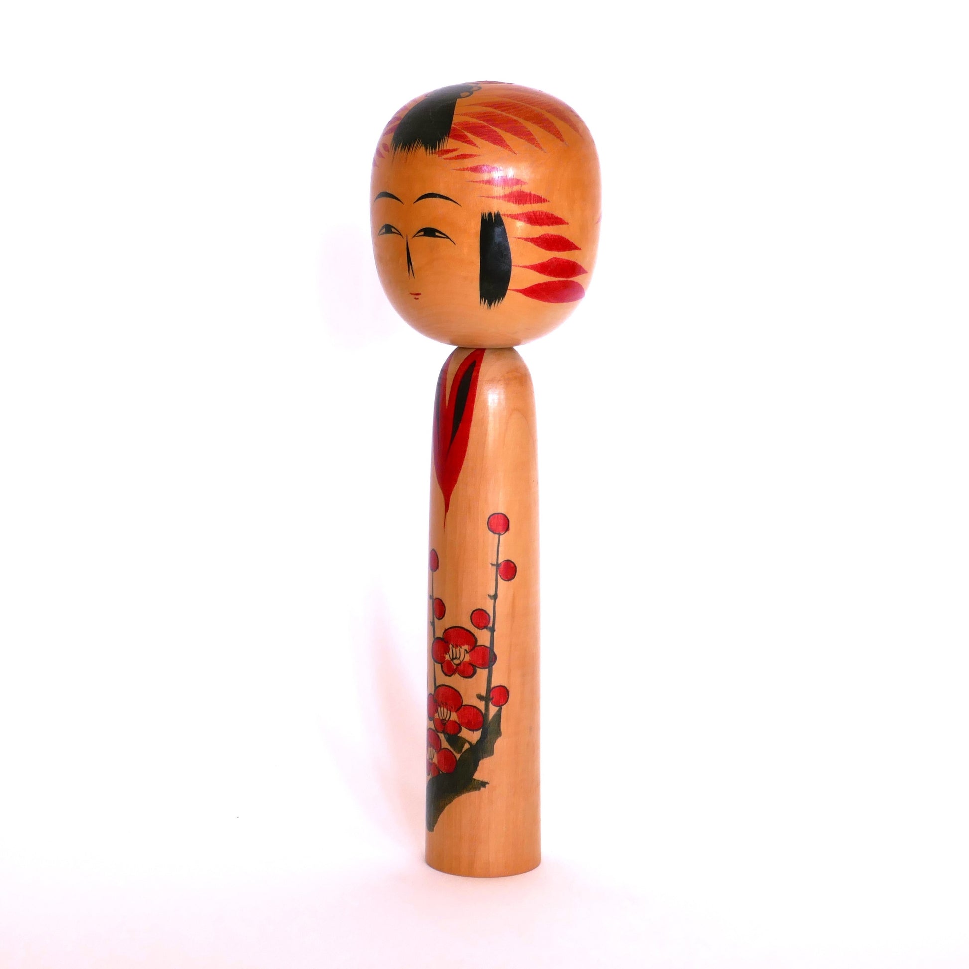 Profil gauche d’une kokeshi Togatta traditionnelle signée Satō Kesakichi – artisanat japonais de la période Shōwa