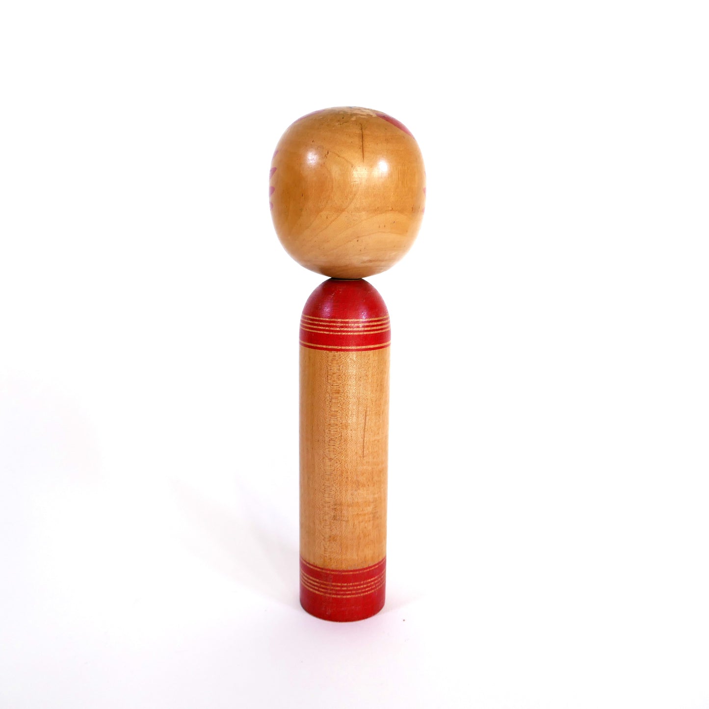 Vue arrière d’une kokeshi ancienne – style Yamagata Sakunami, periode Shōwa