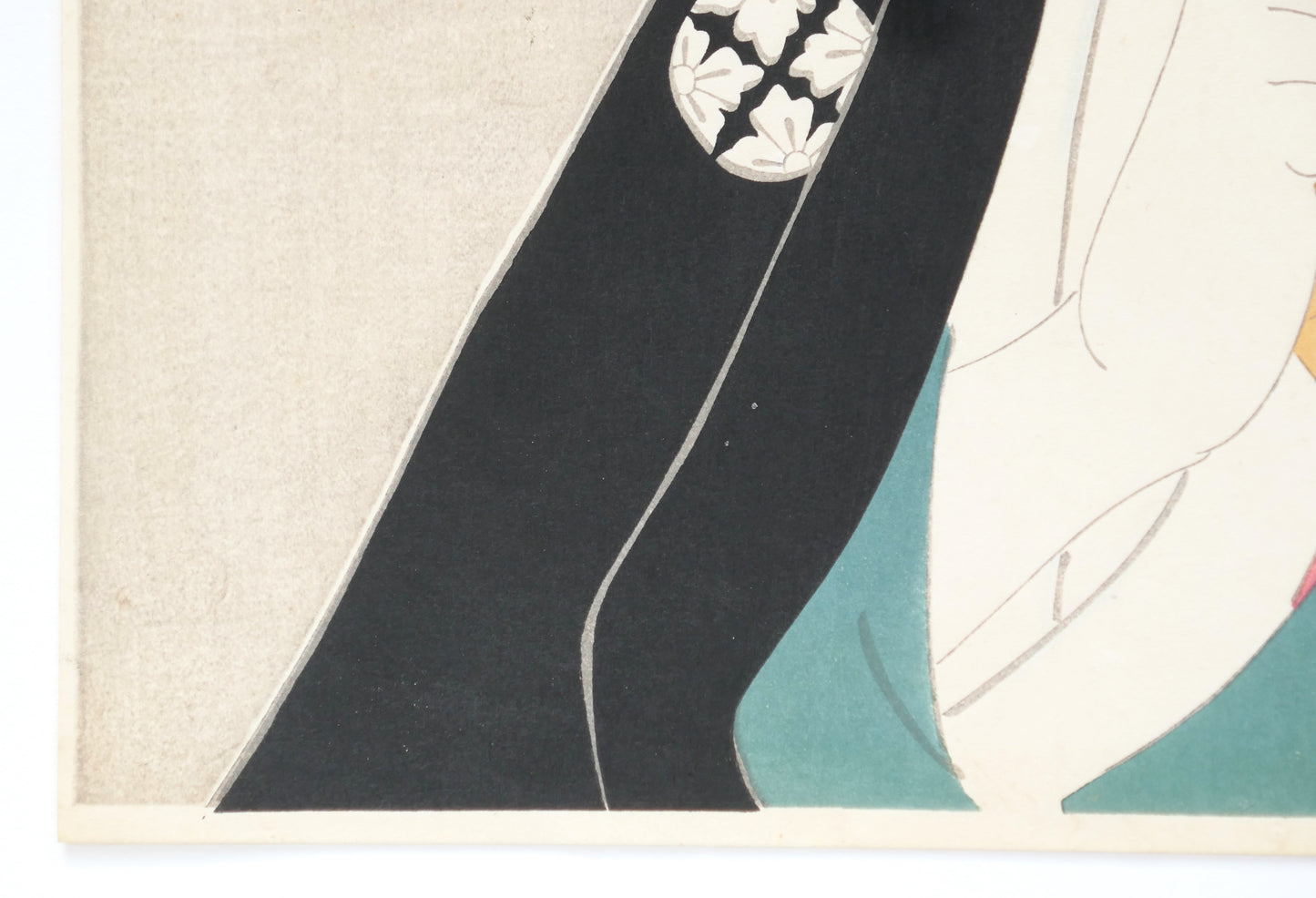 Blason familial (mon) sur le kimono du personnage de Shiga Daishichi, estampe de Sharaku.