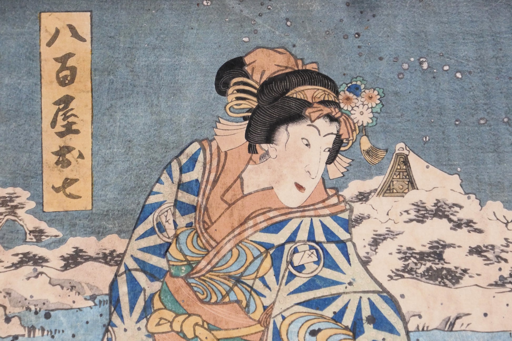 Estampe signée Toyokuni 3 de style Bijin-ga représentant Oshichi la marchande editée par Iseya Kanekichi en 1860. Vue sur le visage d'Oshichi