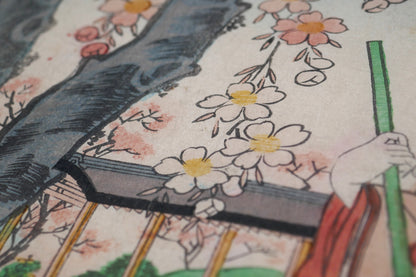 Détail de fleurs de cerisier et main tenant une rame dans une estampe japonaise de Yoshitora scène de hanami sur bateau