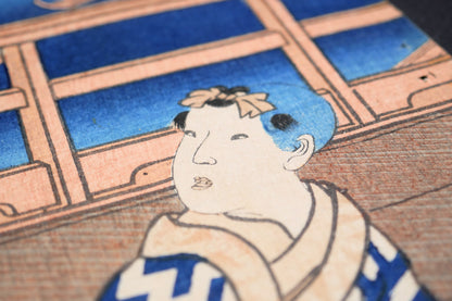 Détail d’un enfant en kimono bleu dans une estampe japonaise bijin-ga de Kunisada Toyokuni III, gravure sur bois ukiyo-e de l’époque Edo.