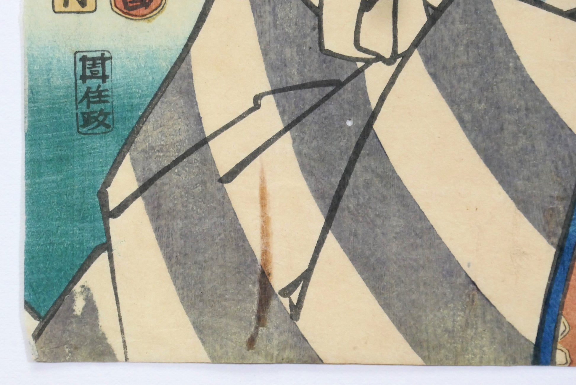 Détail du kimono rayé porté par un acteur de kabuki dans une estampe ukiyo-e