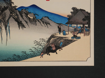 Détail de Sakanoshita, Fudesute mine par Utagawa Hiroshige : voyageurs, bœuf de bât et chaya sur la route du Tōkaidō.