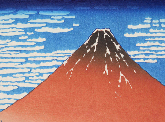 Détail du mont Fuji rouge sous un ciel bleu dans le nishiki-e Gaifū kaisei de Katsushika Hokusai.