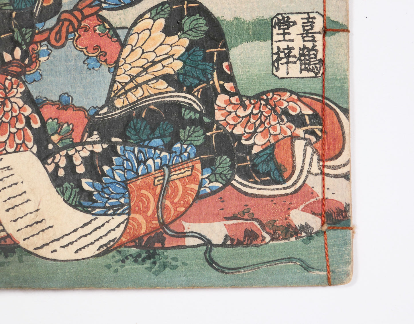 Détail du sceau d’éditeur Kikakudō azusa sur la couverture de Bijin-roku, livre japonais ancien et antiquité Edo originale.