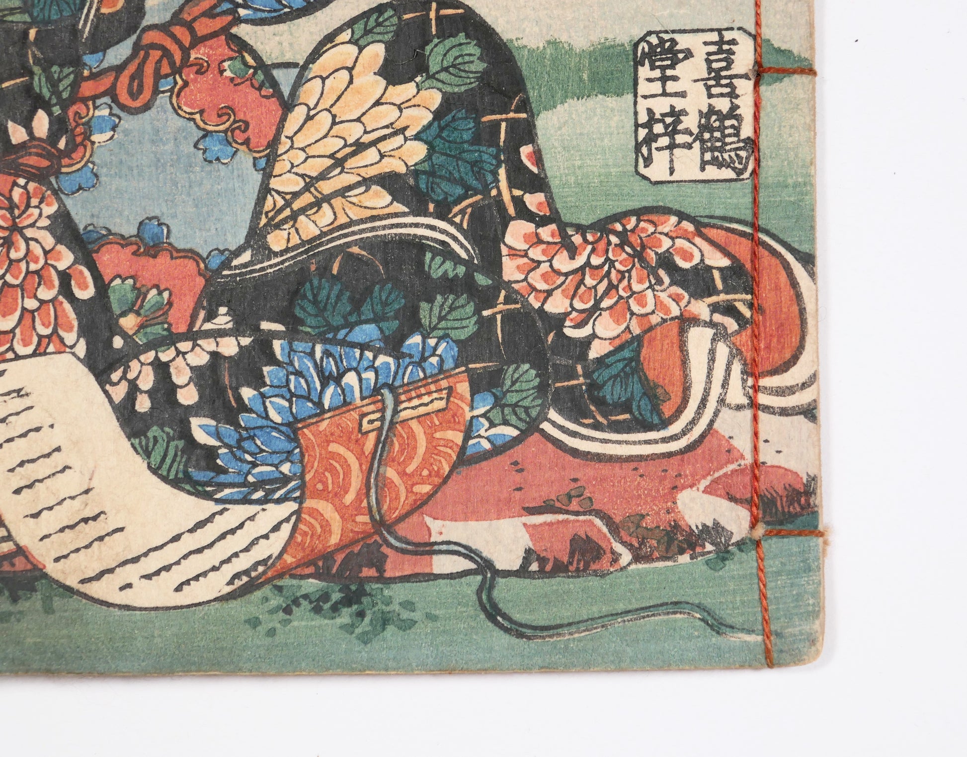 Détail du sceau d’éditeur Kikakudō azusa sur la couverture de Bijin-roku, livre japonais ancien et antiquité Edo originale.