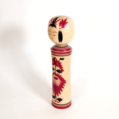 Poupée japonaise kokeshi vintage Naruko à motif chrysanthème, artisanat traditionnel