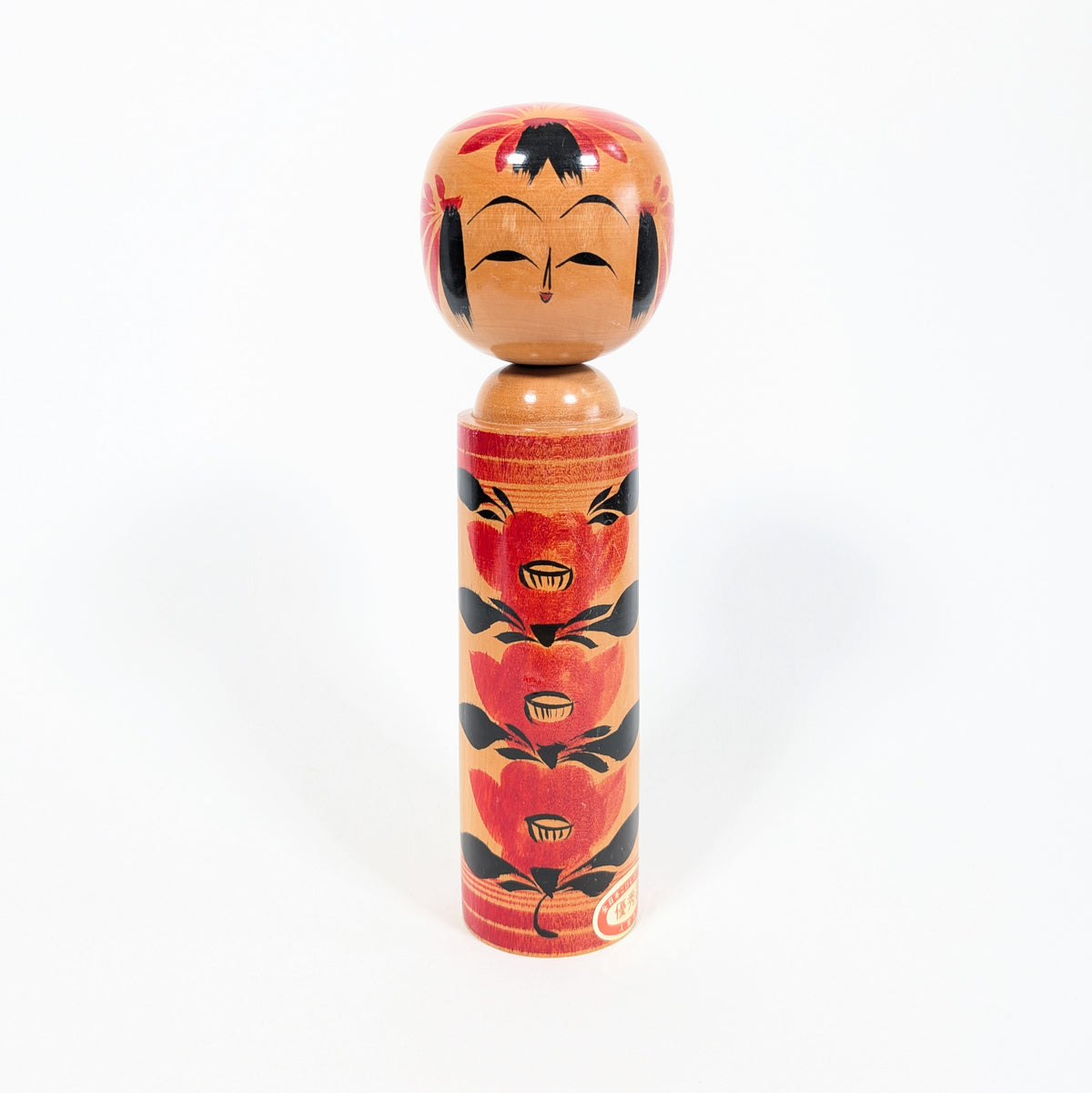 Kokeshi shingata primée au concours national japonais, décor tsubaki rouge et signature Takeshi 武志