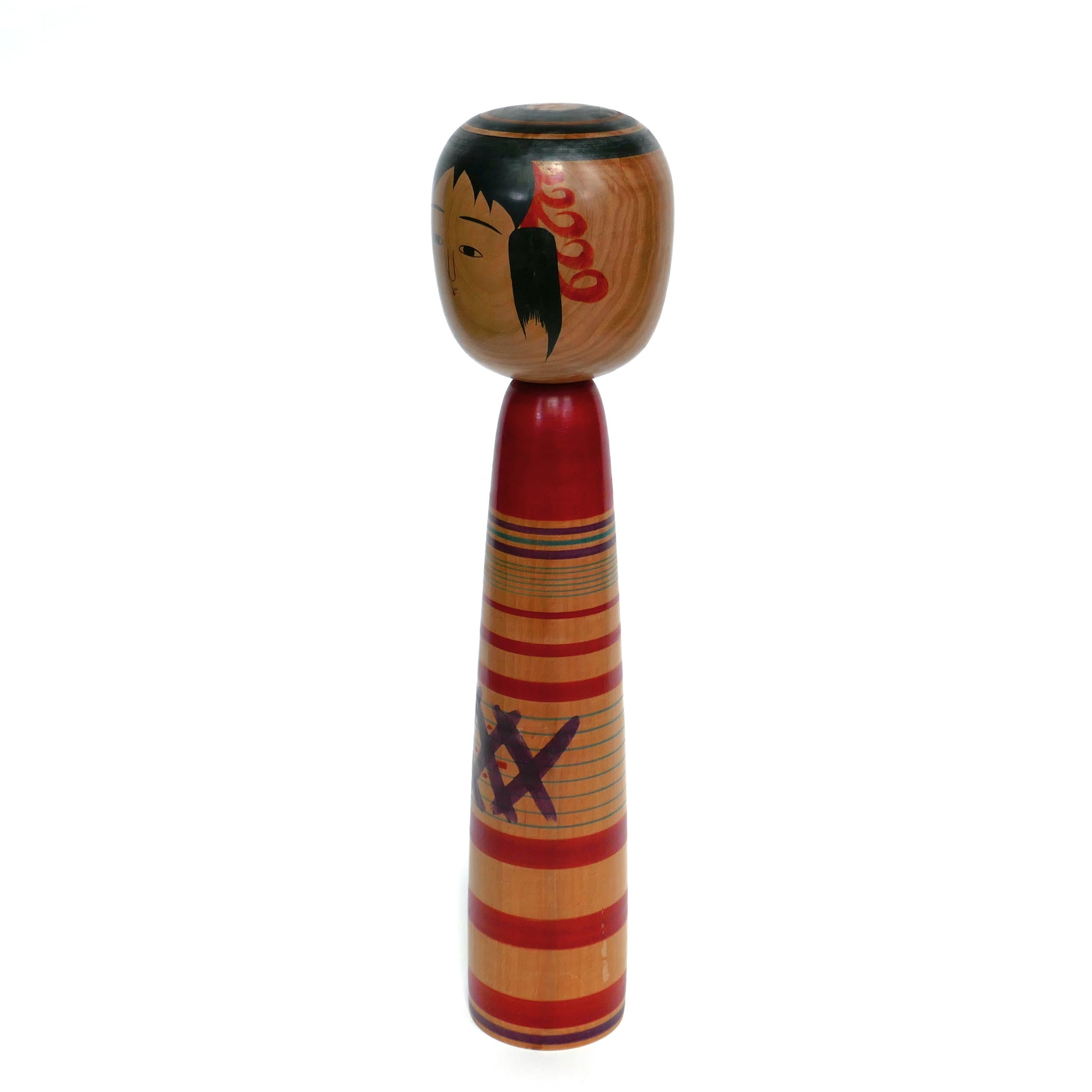 Kokeshi Tsuchiyu par Abe Kazue vue de profil gauche, poupée en bois tournée et peinte à la main, artisanat ancien japonais.