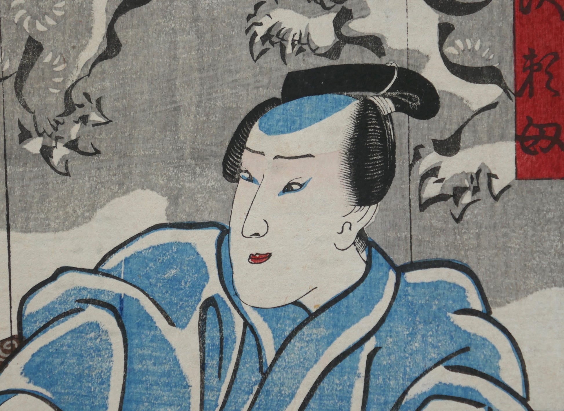 Détail du visage du personnage Tanizawa Tanomo dans l’estampe japonaise originale de Kuniyoshi (pièce kabuki Omegumi ni uruo Iwafuji, 1849–1850, ukiyo-e Edo).