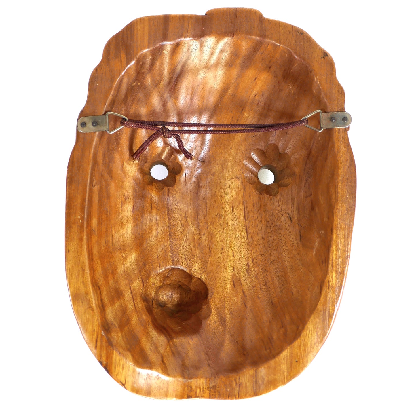Vue arrière du masque Hyottoko, montrant la fixation murale avec corde et attaches métalliques.