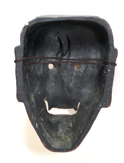 Intérieur d’un masque japonais Shikami, cordons d’origine visibles