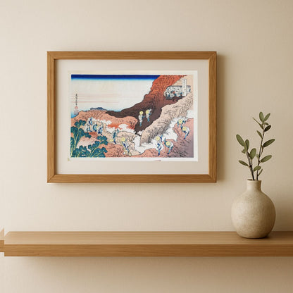 Mise en scène encadrée dans un salon de l'estampe de Hokusai issue de la série des 36 vues du mont Fuji, représentant l'ascension du mont Fuji par des pélerins. Edition Showa