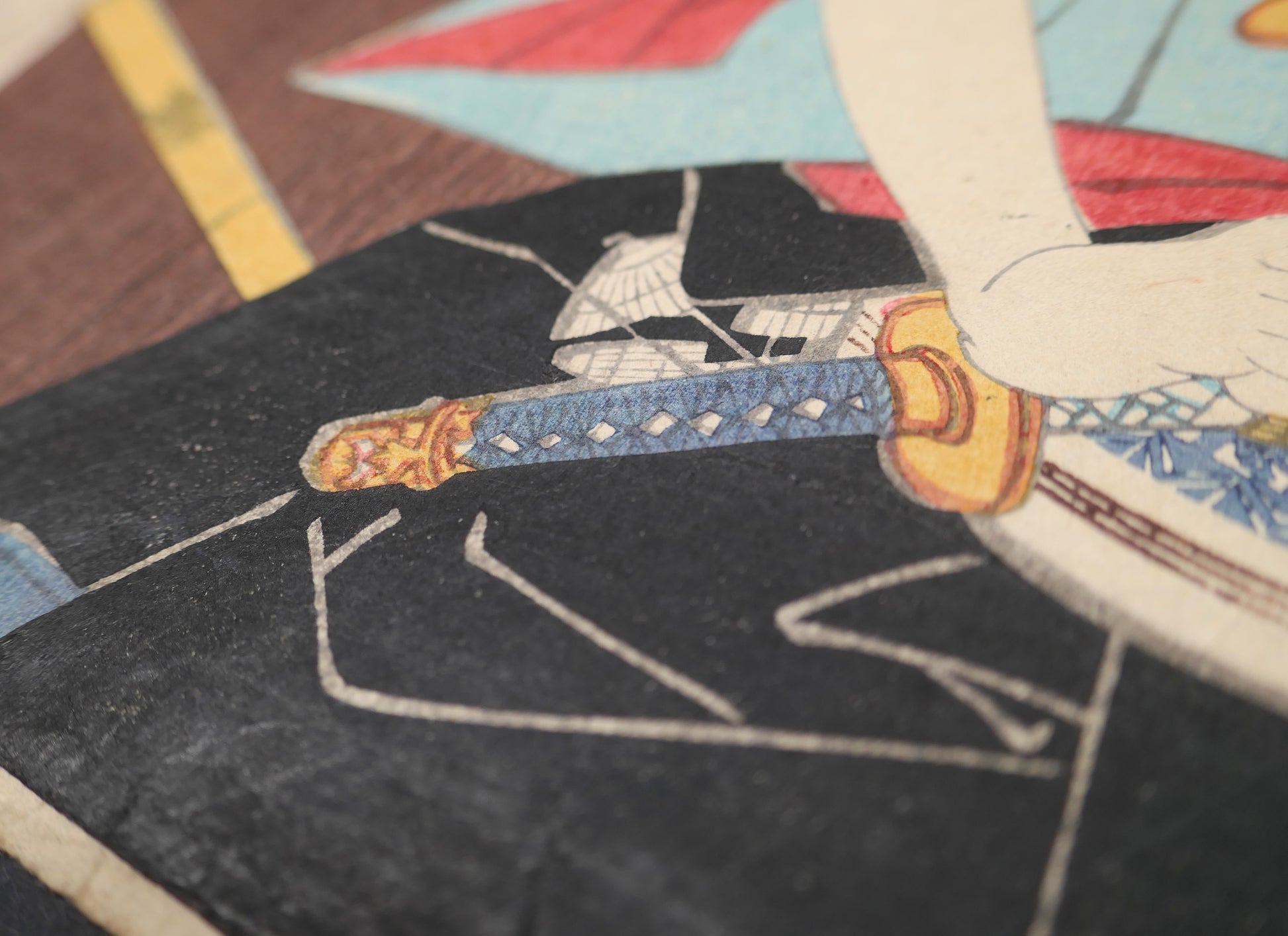 Détail du sabre du samouraï Nagoya Sanza, incarné par l’acteur de kabuki Kawarazaki Gonjuro I dans une estampe originale de Kunisada Toyokuni III.