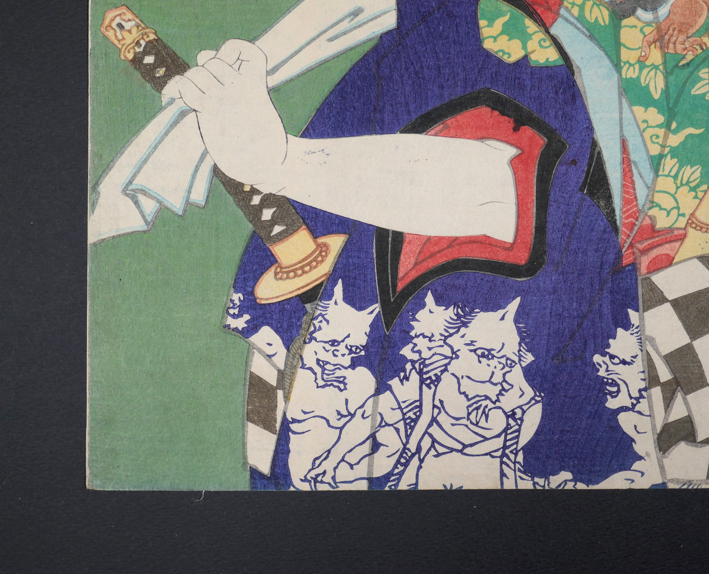Partie inférieure du costume d’Asahina Tōbei ornée de démons oni, détail de l’estampe ancienne de Kunichika.
