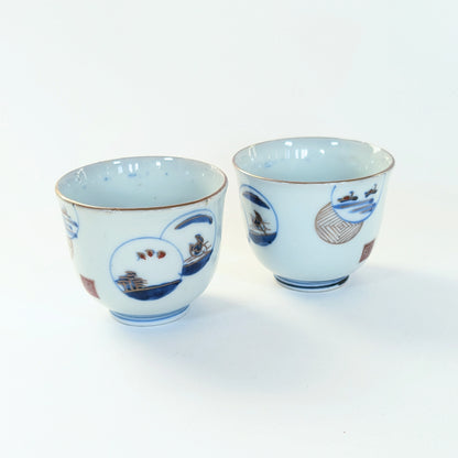 Paire de guinomi Arita en perspective, décor de paysages peints, porcelaine Hizen Edo tardif.