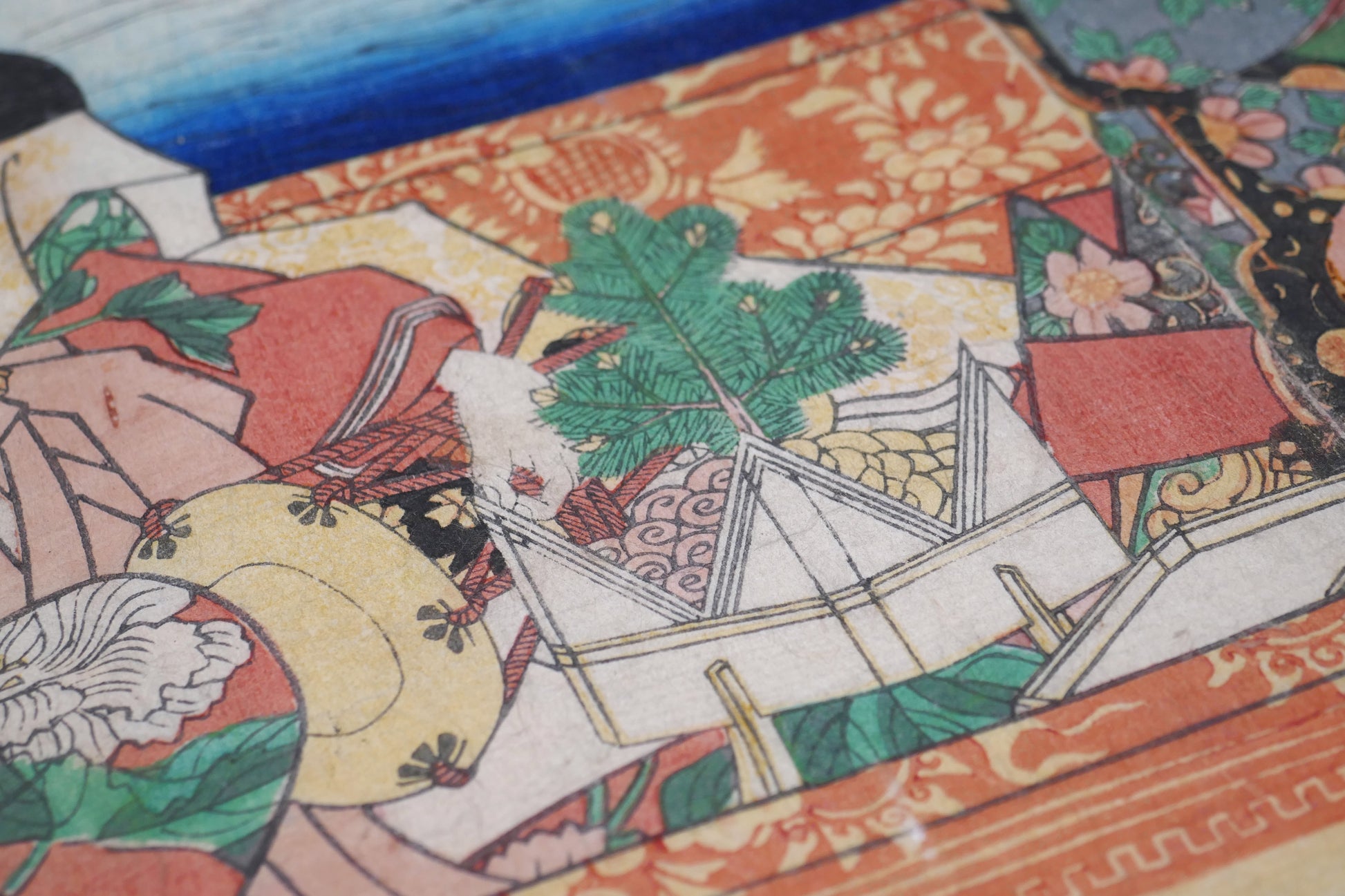 Plateau et nourriture dans une estampe japonaise originale de Yoshitora évoquant un pique-nique hanami raffiné