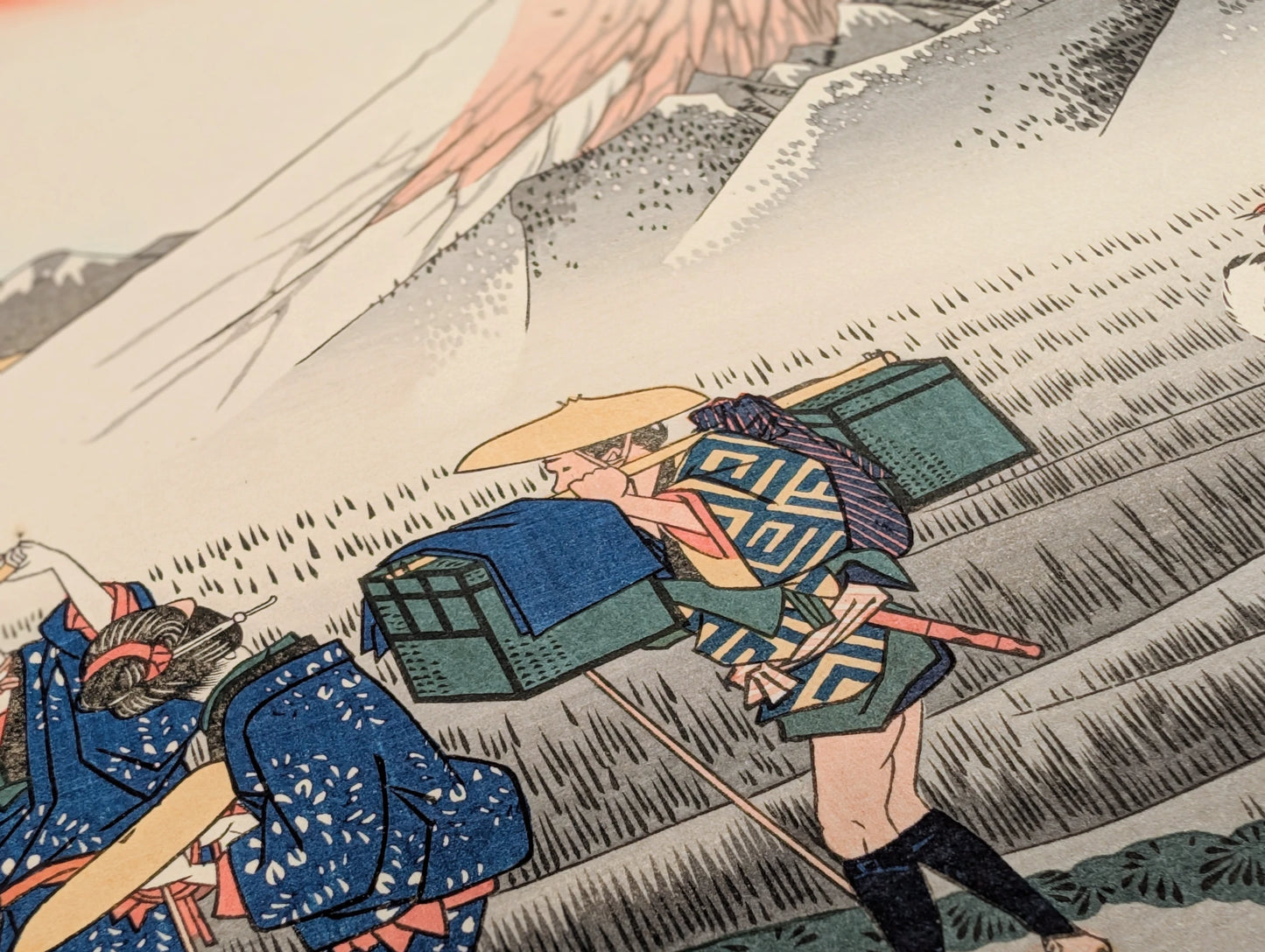 Porteur sur la route du Tokaido dans l’estampe Asa no Fuji de Hiroshige, détail de scène de voyage japonaise
