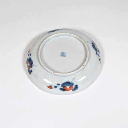 Revers d’une assiette Imari ancienne, porcelaine japonaise Arita avec décor extérieur peint à la main