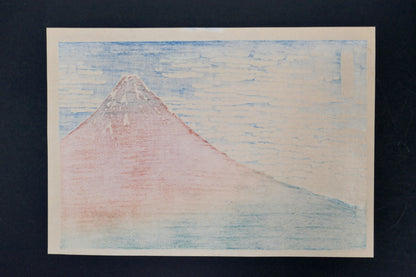 Verso de l’estampe japonaise sur bois de Hokusai, laissant apparaître le passage des pigments dans le papier.